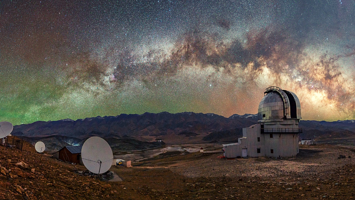 Breathtaking view of Hanle village under the clear Ladakh sky, Hanle Observatory nestled in the rugged mountains of Ladakh, Vast barren landscapes surrounding Hanle, Ladakh, Scenic view of Hanle Monastery perched on a hilltop in Ladakh, Night sky filled with stars over Hanle, a famous stargazing destination in Ladakh, Hanle Valley with remote Ladakhi houses and vast open fields, Serene view of the Changthang plateau near Hanle, Ladakh, Hanle River flowing through the peaceful valley in Ladakh, Remote Hanle village with majestic Himalayan mountains in the background, Pristine beauty of Hanle, one of the highest observatories in the world, Stargazing at Hanle under the crystal-clear Ladakhi night sky.