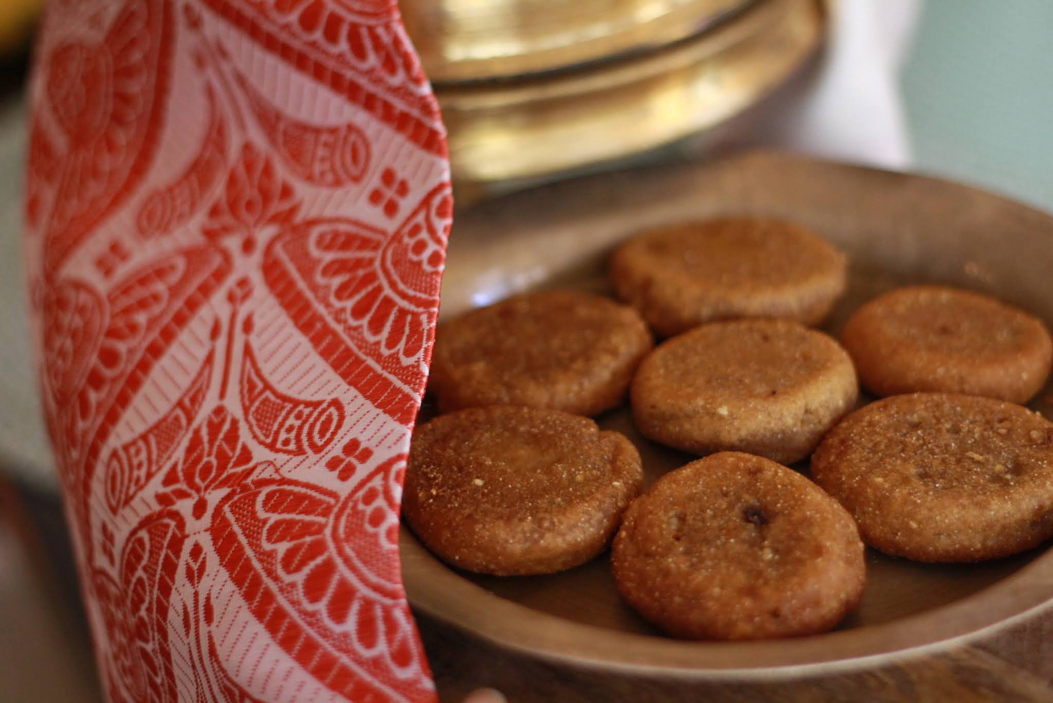 Diwali is celebrated with cherished sweets and snacks made from rice flour, jaggery, and sesame. A highlight is Til Pitha, a festive treat filled with black sesame seeds and jaggery, providing a delightful mix of crunchy and soft textures. Its preparation is meticulous, resulting in a flavorful delicacy that reflects local ingredients. Another popular snack is Ghila Pitha, small deep-fried balls that are crispy and mildly sweet. Often enjoyed with tea, these treats foster a warm atmosphere for families to celebrate together, showcasing the simple yet rich culinary heritage of Assam. 