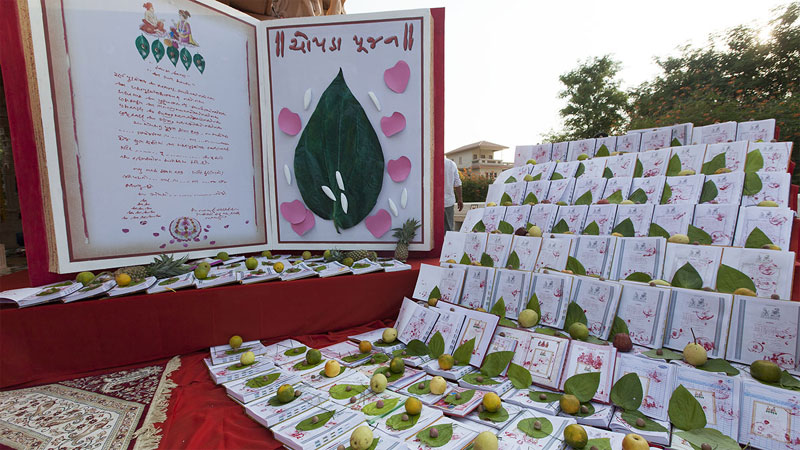 In Gujarat, Diwali signifies the end of the financial year, celebrated with Chopda Puja for new account books. This image showcases homes beautifully decorated with diyas and rangoli designs, while families prepare traditional snacks like ghughra and sweets such as mohanthal. The scene captures the lively spirit of Gujarat, with people engaging in garba and dandiya dances, as diyas light up homes and firecrackers illuminate the night sky, blending tradition, spirituality, and joy during the festivities.