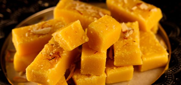Diwali celebrations are marked by an assortment of traditional sweets and snacks that are both unique and flavorful, Adhirasam, a doughnut-shaped sweet made from rice flour and jaggery, is a Diwali classic, requiring skillful fermentation for the perfect crispy and chewy texture, Mysore Pak, a rich fudge made from gram flour, ghee, and sugar, is another festive favorite, known for its melt-in-the-mouth texture, Mysore Pak is loved by people of all ages, Seedai, a small, round, and crunchy snack made from rice flour, is also enjoyed during Diwali in Tamil Nadu, adding a savory balance to the sweet treats 