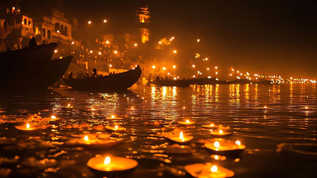  A mesmerizing scene unfolds on the ghats of Varanasi during Dev Diwali, where thousands of diyas (earthen lamps) are meticulously arranged along the riverbanks, creating an awe-inspiring display of light, The shimmering reflections of these lamps on the Ganges transform the river into a sparkling pathway of divine energy, symbolizing the arrival of gods to Earth, Each diya, lit with reverence, carries prayers for peace, prosperity, and spiritual growth, offering gratitude to the goddess Ganga for her blessings and purifying powers, The atmosphere is surreal, with the glowing ghats radiating a sense of unity, hope, and the triumph of light over darkness, leaving an unforgettable impression on all who witness it